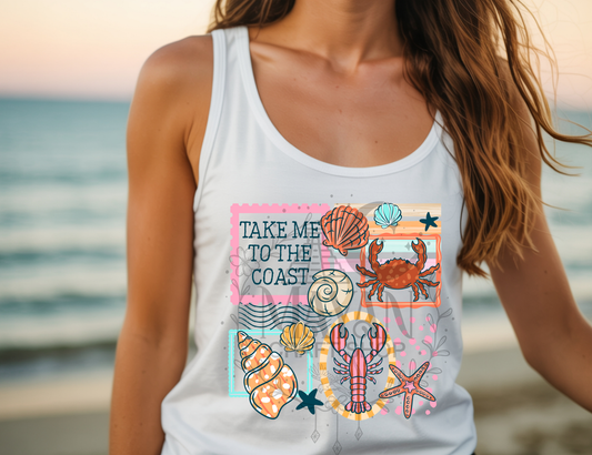 Person wearing a white tank top with coastal design and text 'Take Me to the Coast' on a beach.