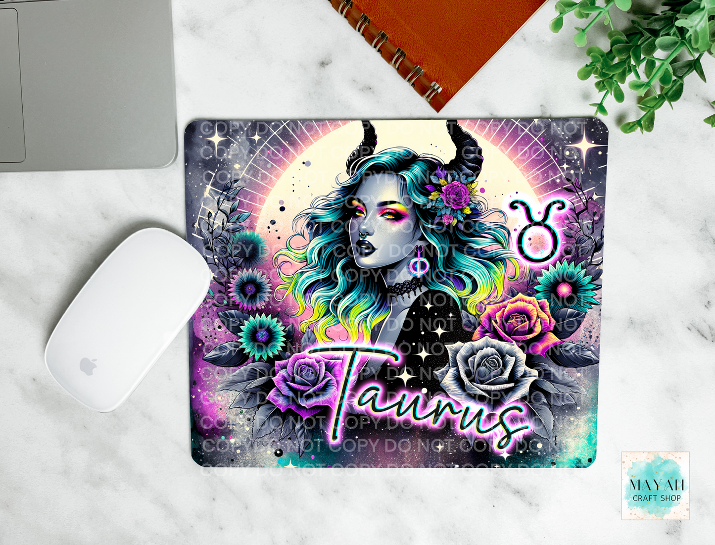 Taurus mouse pad. -Mayan Craft Shop