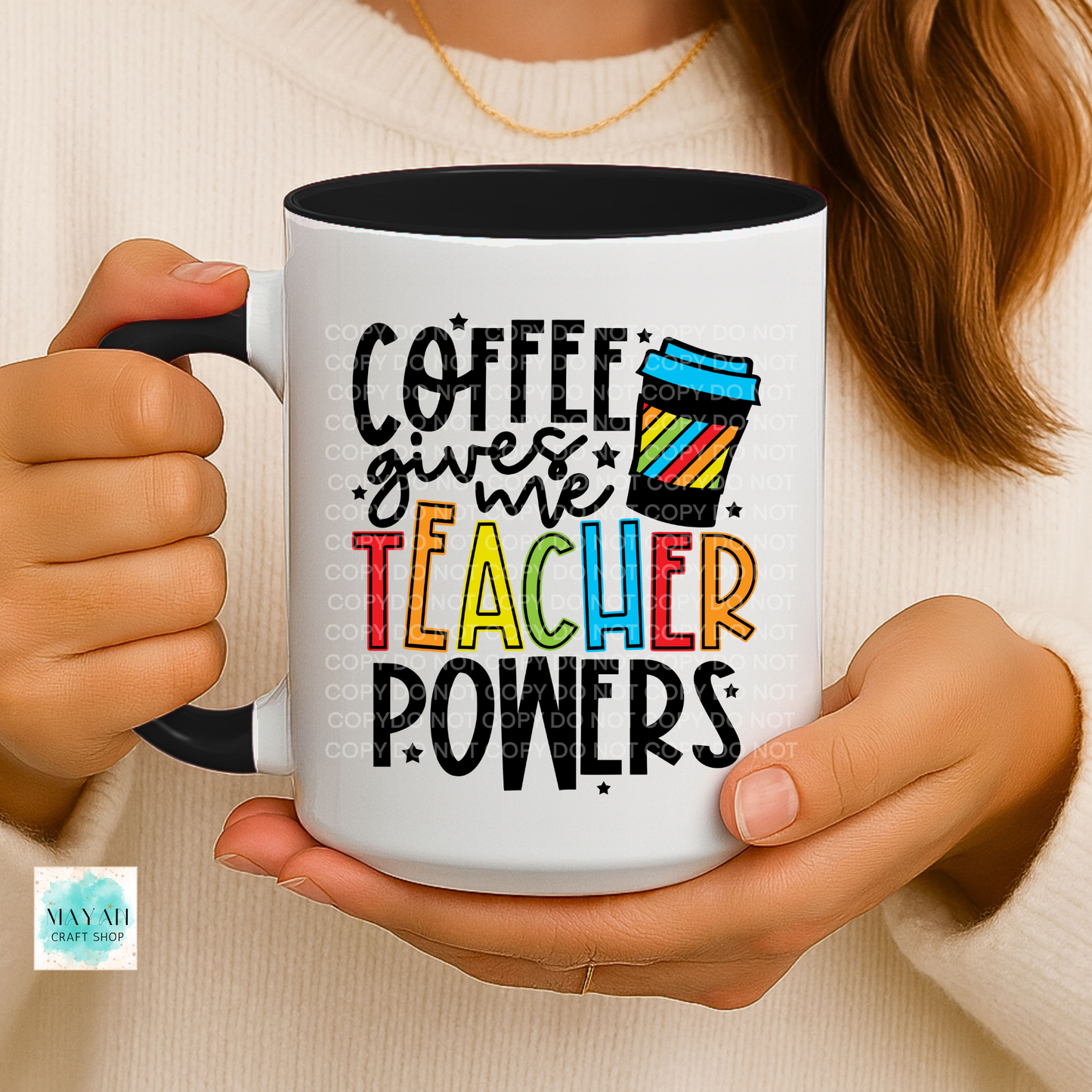 Person holding a mug with 'Coffee gives me teacher powers' text