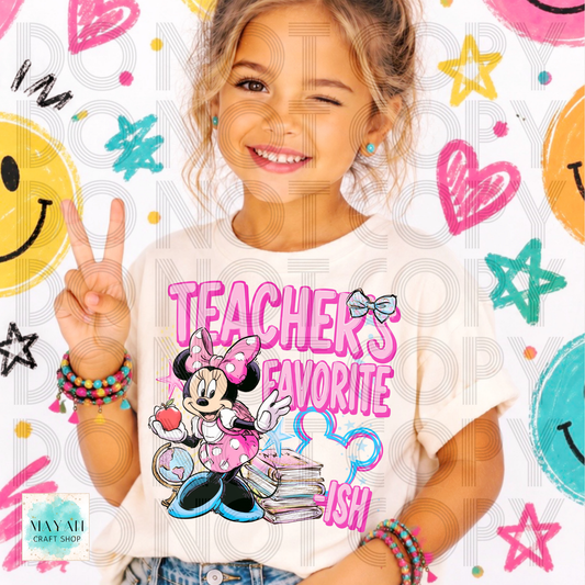 A young girl with blonde hair posing in a white graphic t-shirt cartoon and the text 'TEACHERS FAVORITE' in pink. She is making a peace sign, wearing colorful beaded bracelets, against a white background decorated with colorful faces, stars, and hearts.