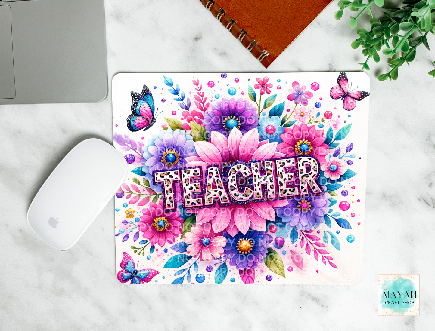 Floral teacher mouse pad.