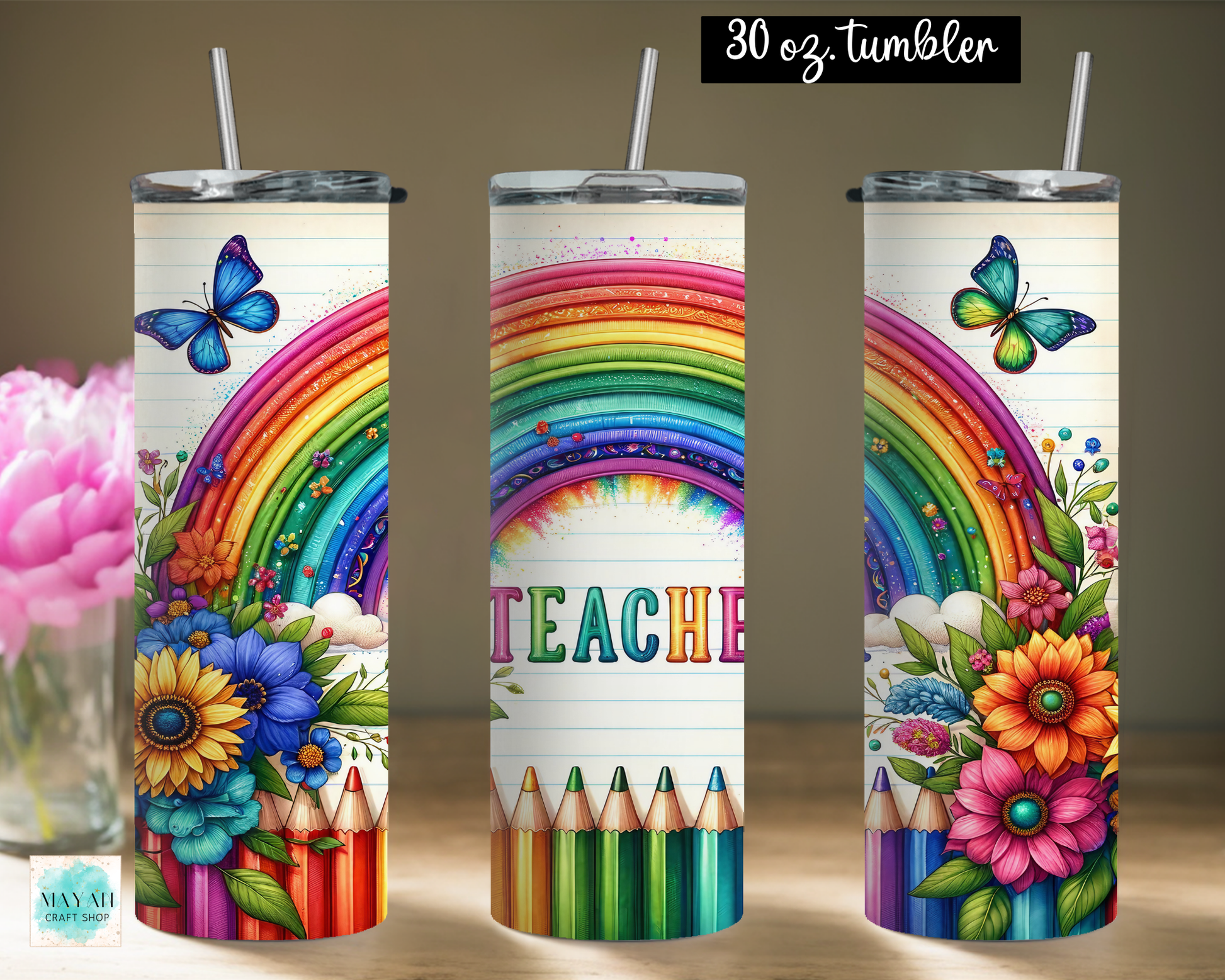 Three views of a 20 oz stainless steel tumbler with a colorful rainbow, flowers, pencils, butterflies, and the word 'TEACHER' printed on it, shown on a neutral background with a pink flower vase on the left.