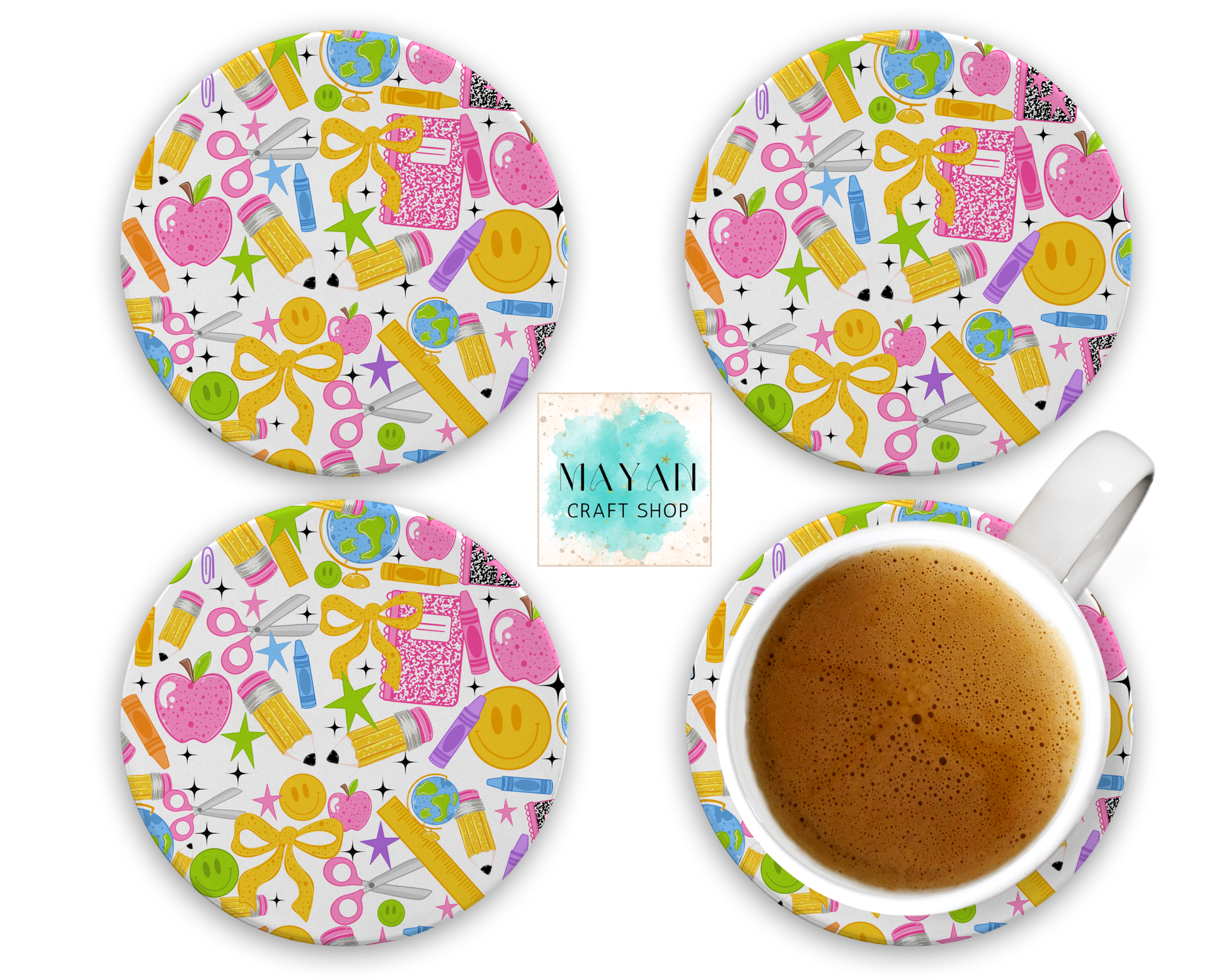 Four round coasters with a colorful craft-themed pattern are displayed on a white background, including one coaster shown under a white cup of coffee. The pattern features illustrations of scissors, crayons, apples, notebooks, and bows in pink, yellow, green, blue, and orange on a white base.