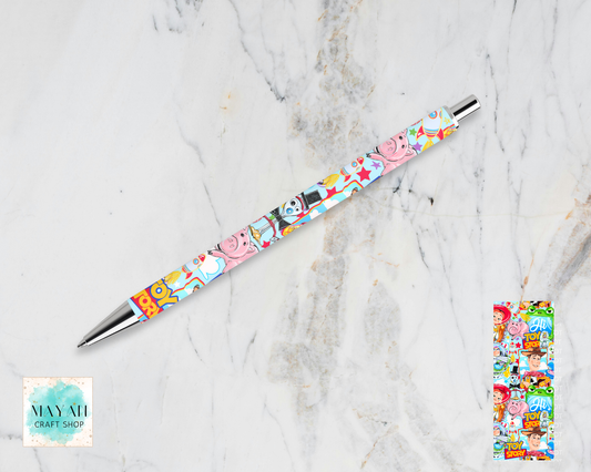 Colorful pen with character design on a marble surface.