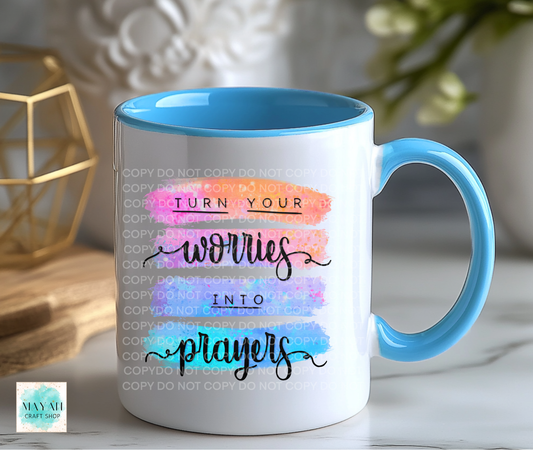 Mug with motivational quote and blue interior and handle on a blurred background