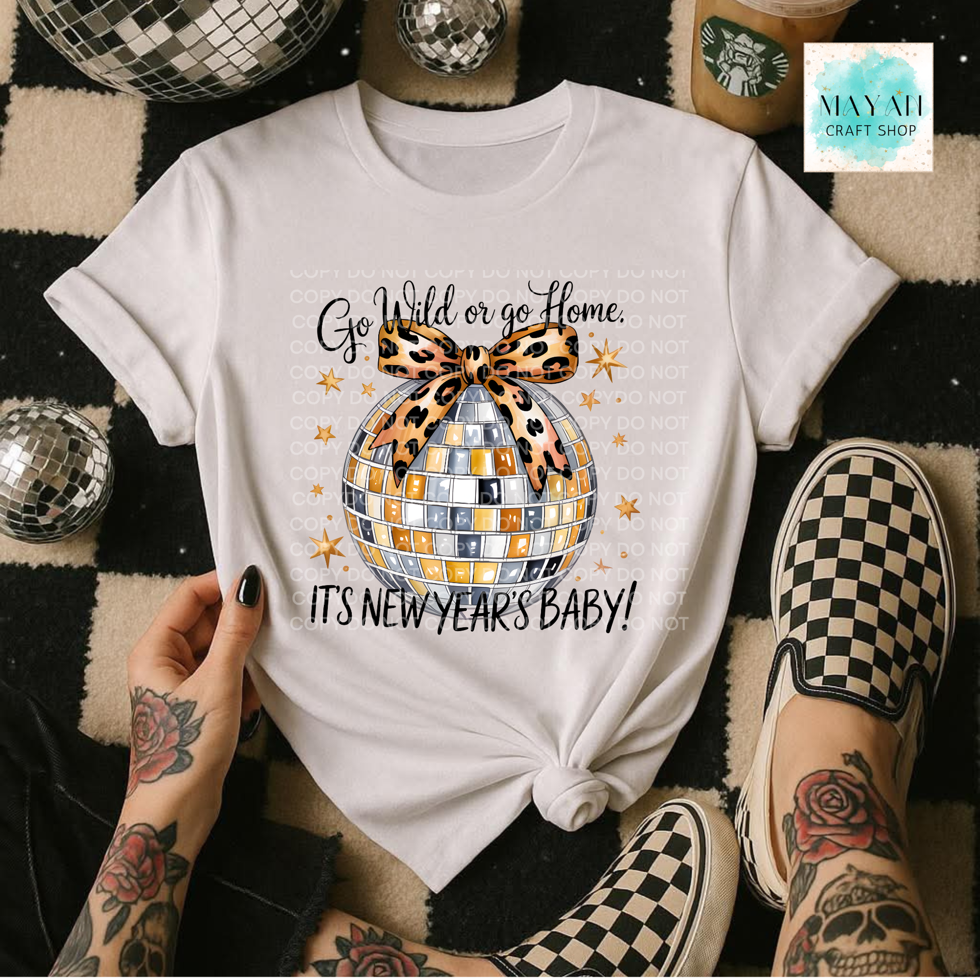 It's New Years shirt. -Mayan Craft Shop