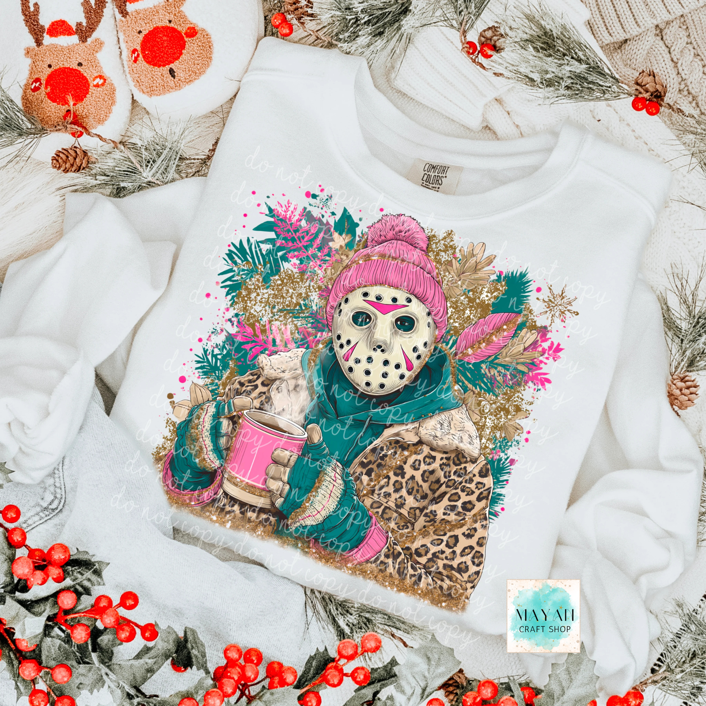 White sweatshirt with a colorful graphic of a snowman wearing a pink hat and leopard print coat, surrounded by winter elements.