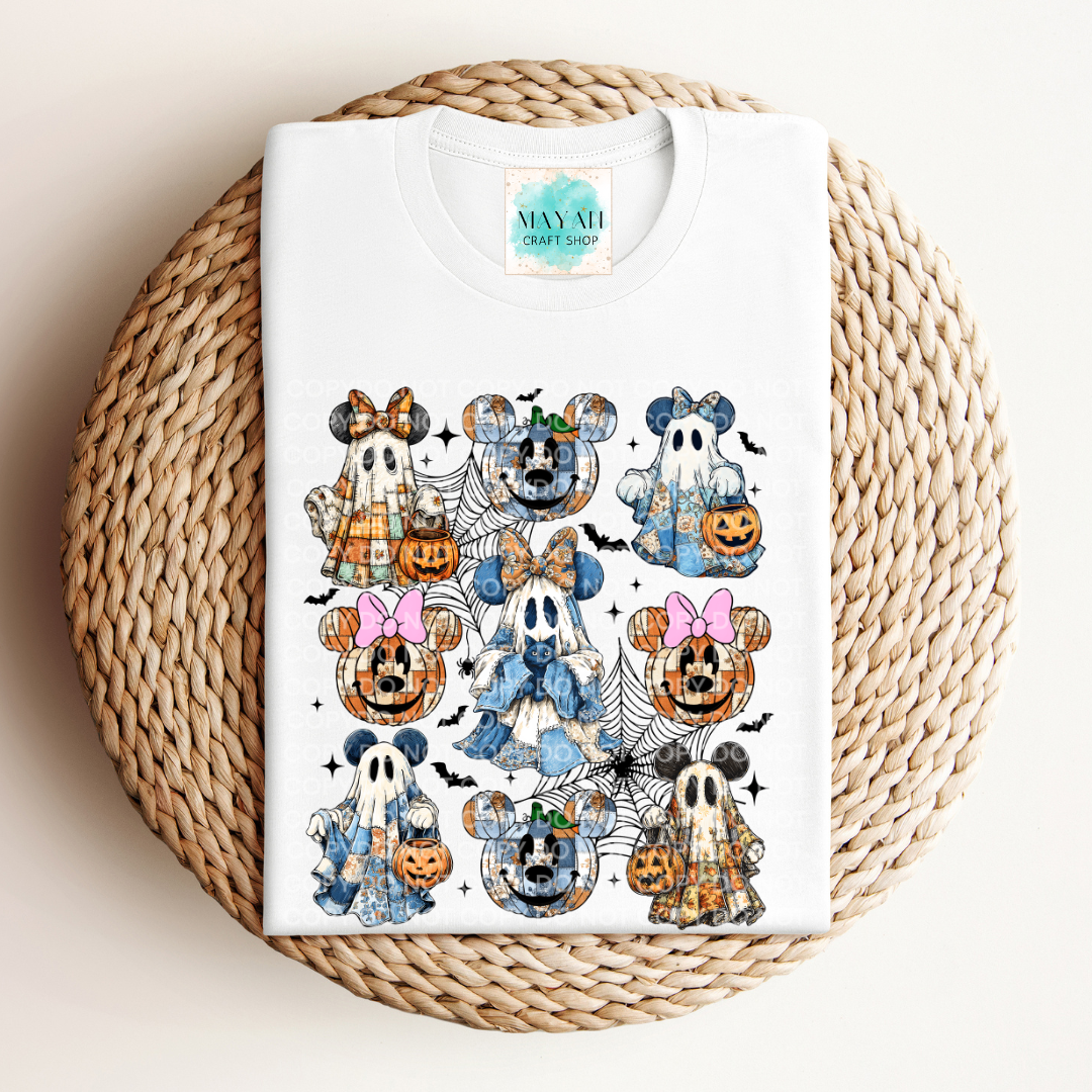 White t-shirt with Halloween-themed character designs on a woven basket