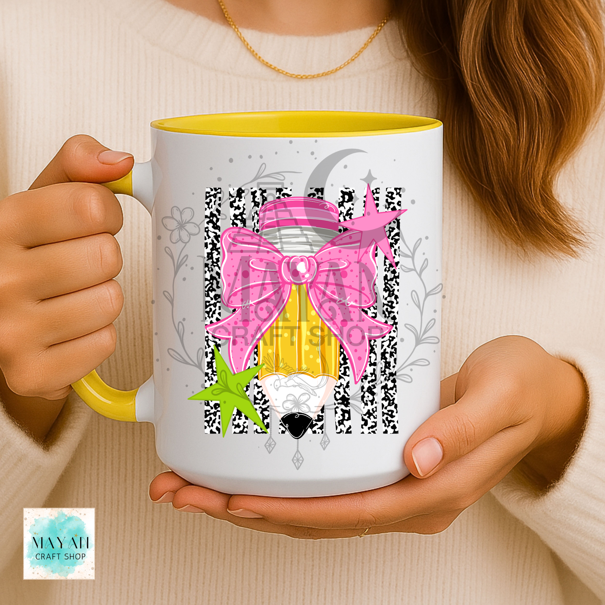 Pencil bow yellow mug.